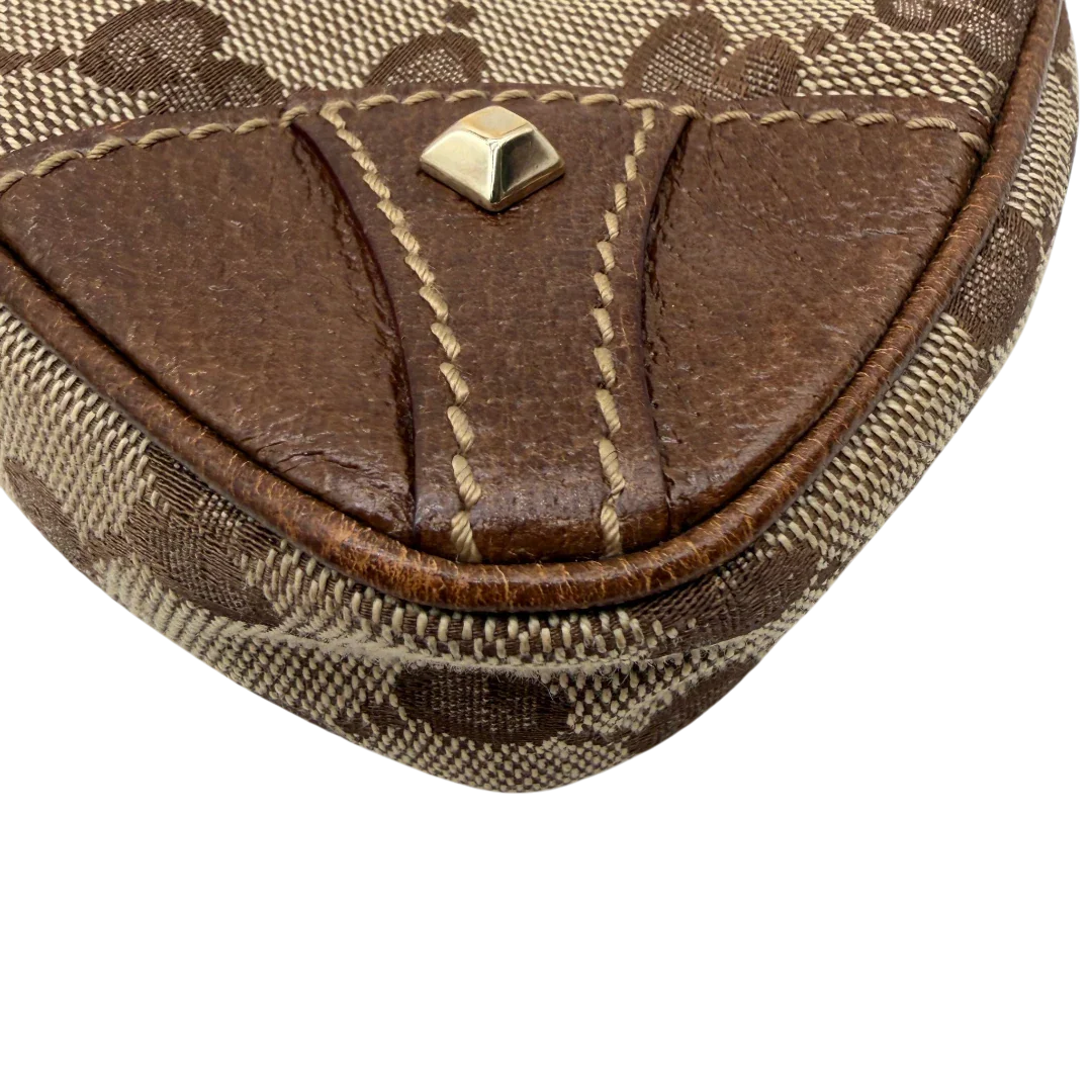 https://cdn.shopify.com/s/files/1/0564/9376/8855/files/Gucci_Handtasche_Soho_Leder_in_schwarz_mit_Nieten_Vintage_GG8268.webp?v=1781052191