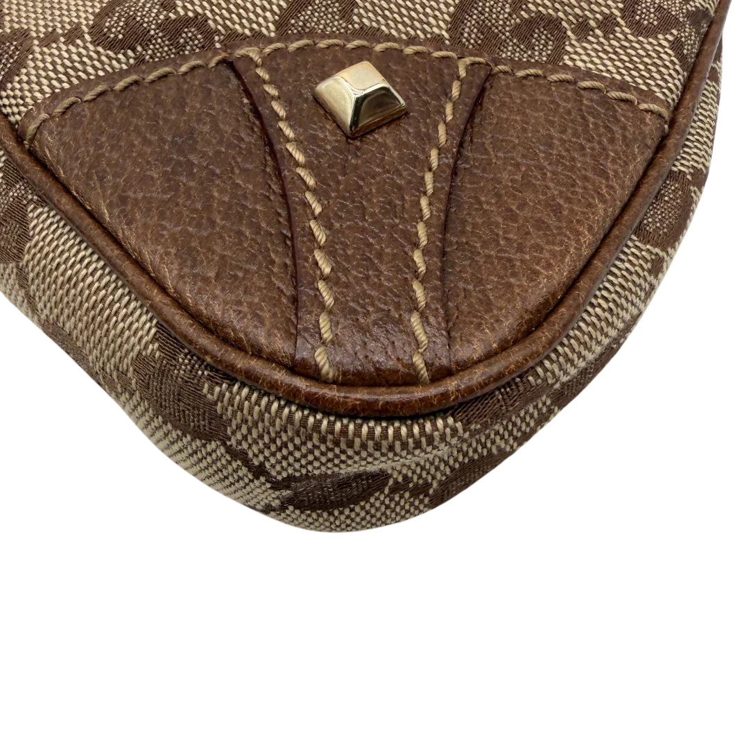 https://cdn.shopify.com/s/files/1/0564/9376/8855/files/Gucci_Handtasche_Soho_Leder_in_schwarz_mit_Nieten_Vintage_GG8270.webp?v=1781052191