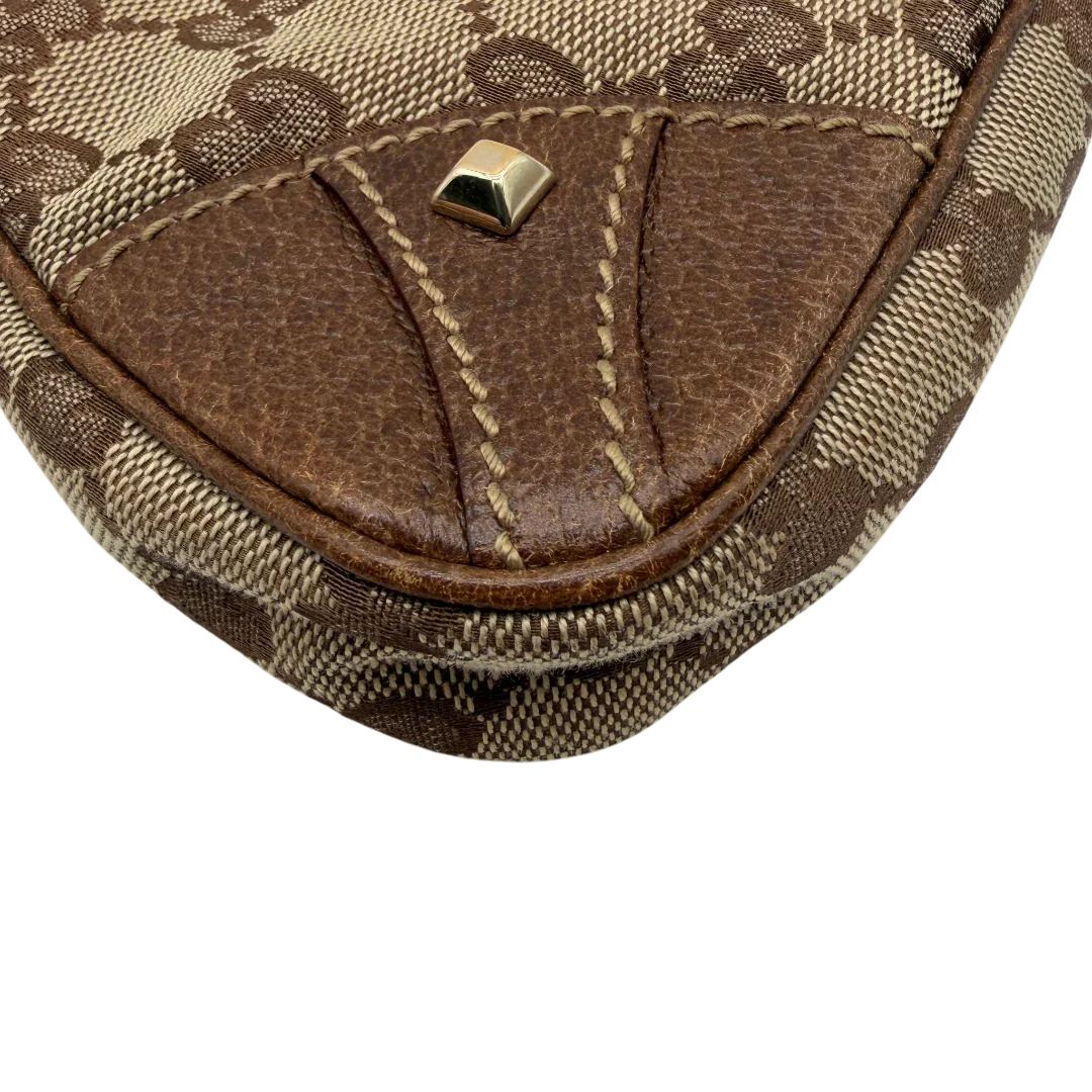 https://cdn.shopify.com/s/files/1/0564/9376/8855/files/Gucci_Handtasche_Soho_Leder_in_schwarz_mit_Nieten_Vintage_GG8271.webp?v=1781052191