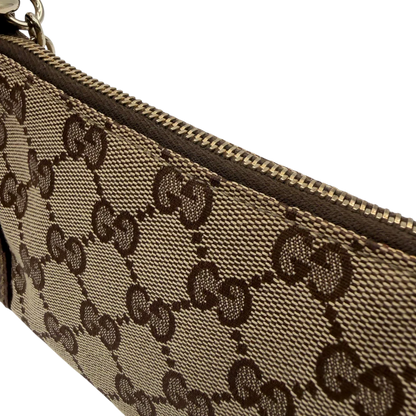 https://cdn.shopify.com/s/files/1/0564/9376/8855/files/Gucci_Handtasche_Soho_Leder_in_schwarz_mit_Nieten_Vintage_GG8276.webp?v=1781052191
