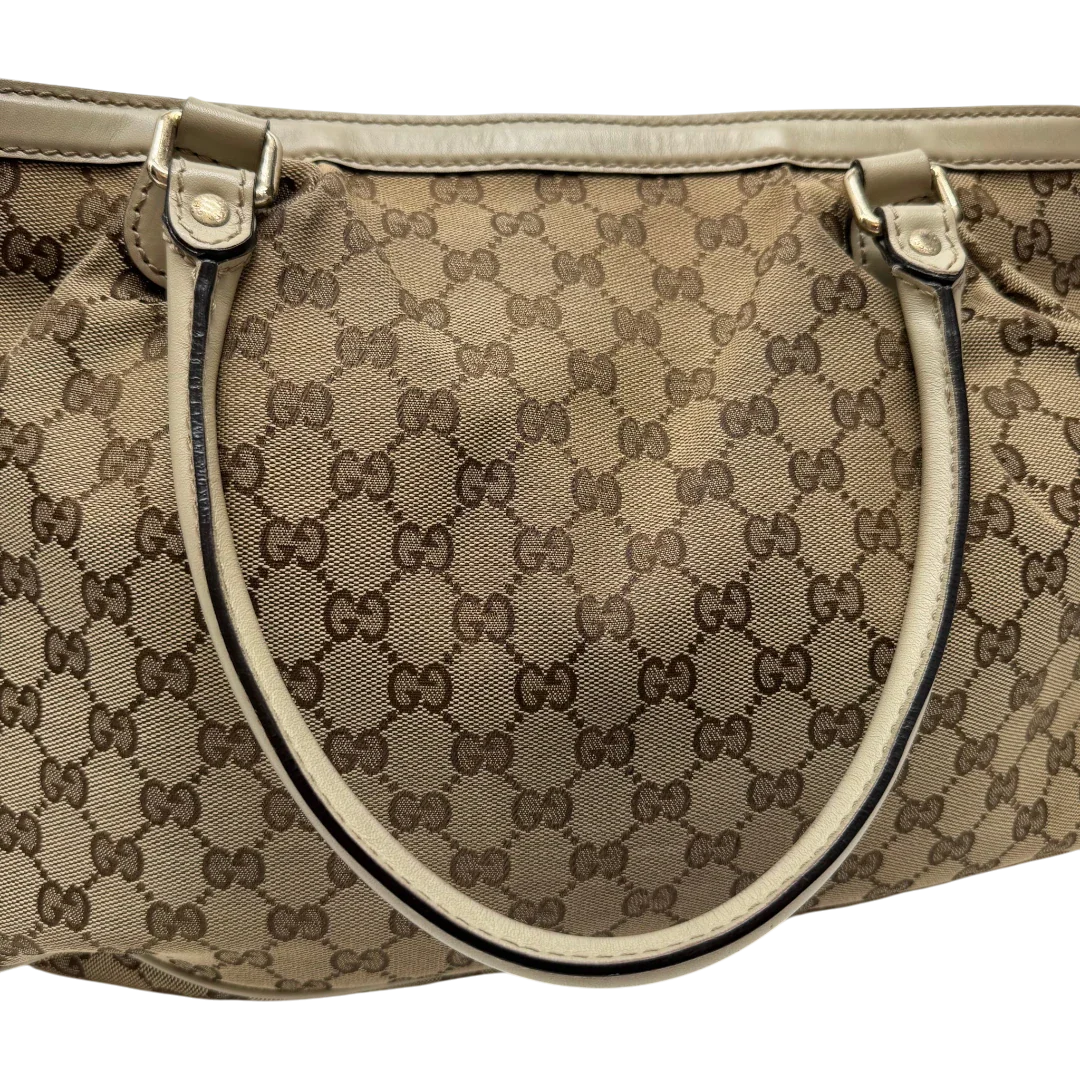 https://cdn.shopify.com/s/files/1/0564/9376/8855/files/Gucci_Handtasche_Sukey_Tote_Bag_monogram_beige_12_82188f5c-8d67-4185-80af-ede4e9bfba81.webp?v=1784240615