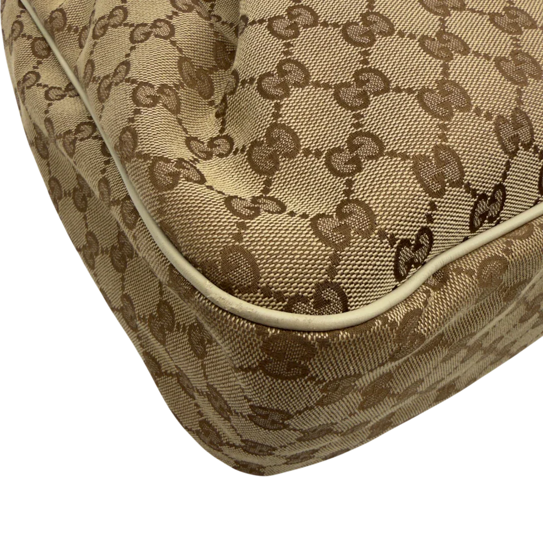 https://cdn.shopify.com/s/files/1/0564/9376/8855/files/Gucci_Handtasche_Sukey_Tote_Bag_monogram_beige_8.webp?v=1782908321