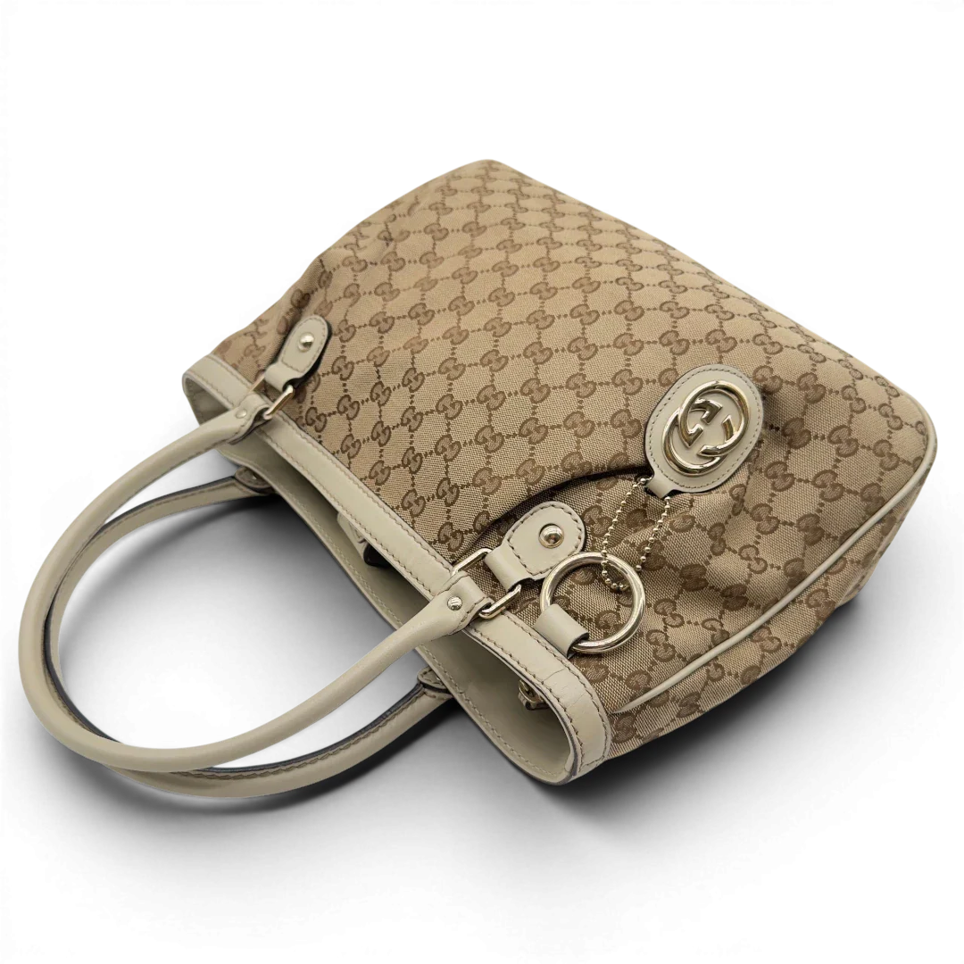 https://cdn.shopify.com/s/files/1/0564/9376/8855/files/Gucci_Handtasche_Sukey_Tote_Bag_monogram_beige_9.webp?v=1782908321