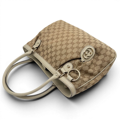 https://cdn.shopify.com/s/files/1/0564/9376/8855/files/Gucci_Handtasche_Sukey_Tote_Bag_monogram_beige_9.webp?v=1782908321