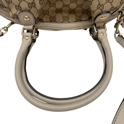 https://cdn.shopify.com/s/files/1/0564/9376/8855/files/Gucci_Handtasche_Sukey_mit_Umhangegurt_monogram_beige_10_74122c60-7ccd-4ae1-b8fd-a9c62376d250.webp?v=1783513326
