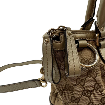 https://cdn.shopify.com/s/files/1/0564/9376/8855/files/Gucci_Handtasche_Sukey_mit_Umhangegurt_monogram_beige_12_7521a09b-b36e-4209-8bdf-9bfbc375c892.webp?v=1784126195
