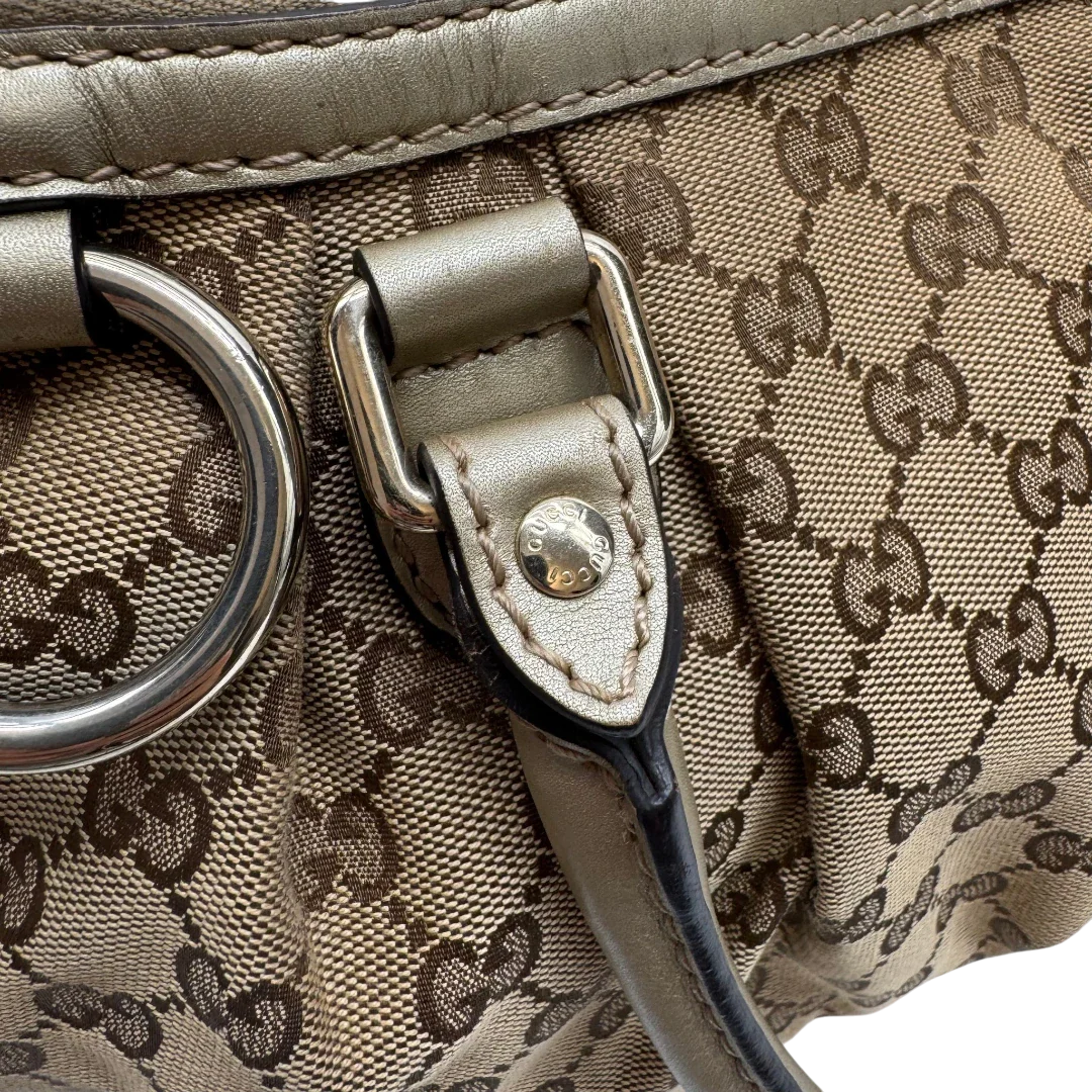 https://cdn.shopify.com/s/files/1/0564/9376/8855/files/Gucci_Handtasche_Sukey_mit_Umhangegurt_monogram_beige_14_4299298a-1309-4480-b1c6-071a78534db6.webp?v=1784126196