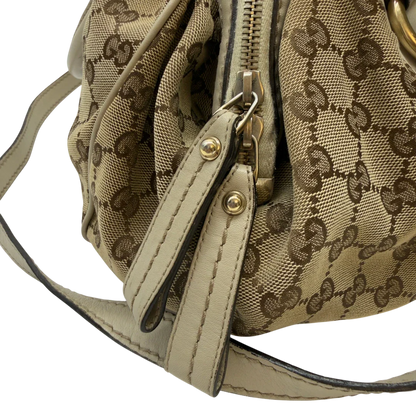 https://cdn.shopify.com/s/files/1/0564/9376/8855/files/Gucci_Handtasche_Sukey_mit_Umhangegurt_monogram_beige_14_448e1905-80f7-42cd-97ca-343225a65d14.webp?v=1783513327