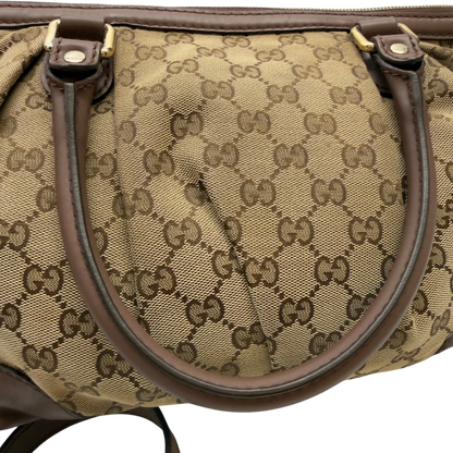 https://cdn.shopify.com/s/files/1/0564/9376/8855/files/Gucci_Handtasche_Sukey_mit_Umhangegurt_monogram_beige_14_aec128c8-44f7-4759-9738-5f1289decce3.webp?v=1783513164