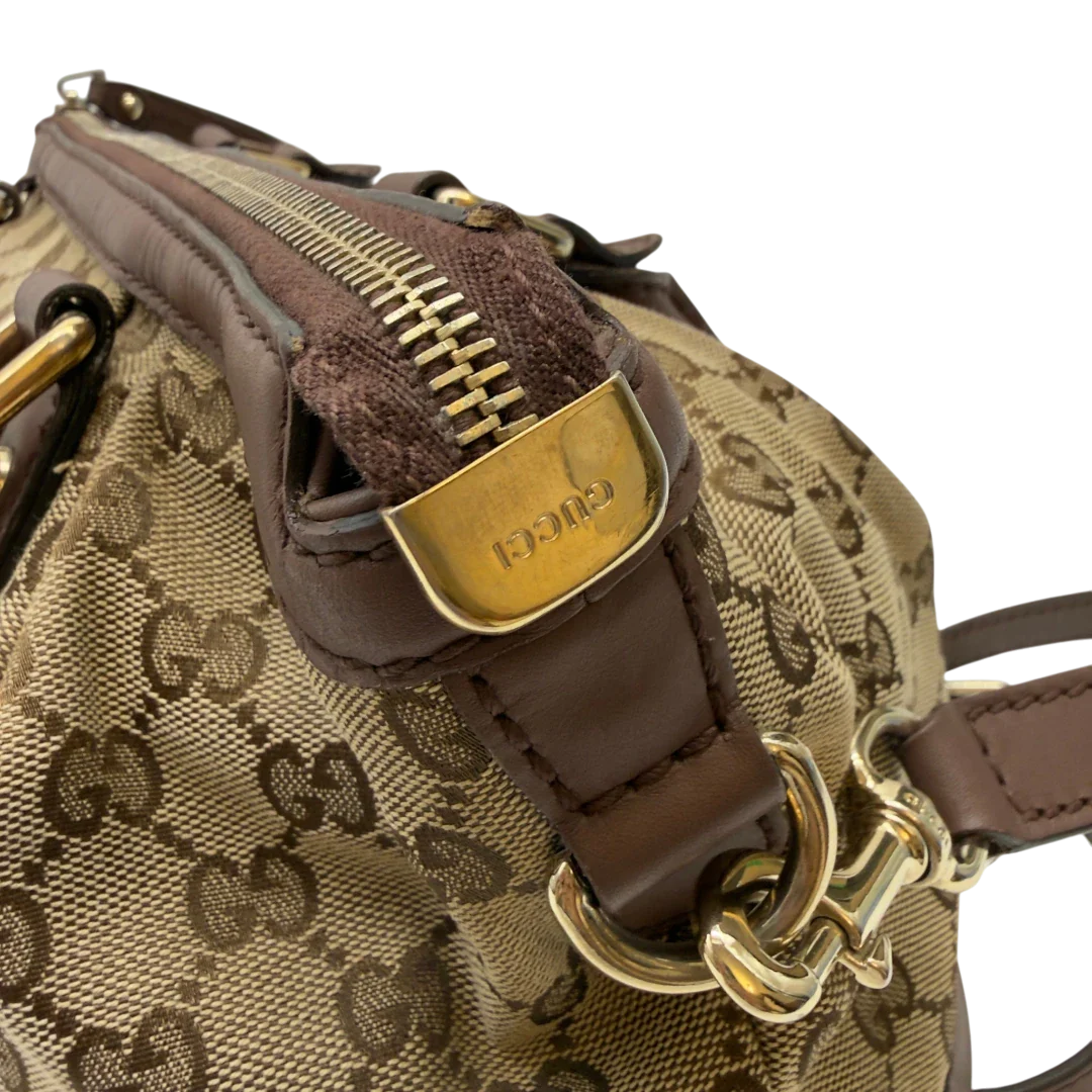 https://cdn.shopify.com/s/files/1/0564/9376/8855/files/Gucci_Handtasche_Sukey_mit_Umhangegurt_monogram_beige_16_4ef3a380-68fe-4ec4-95de-032357b57cba.webp?v=1783513163