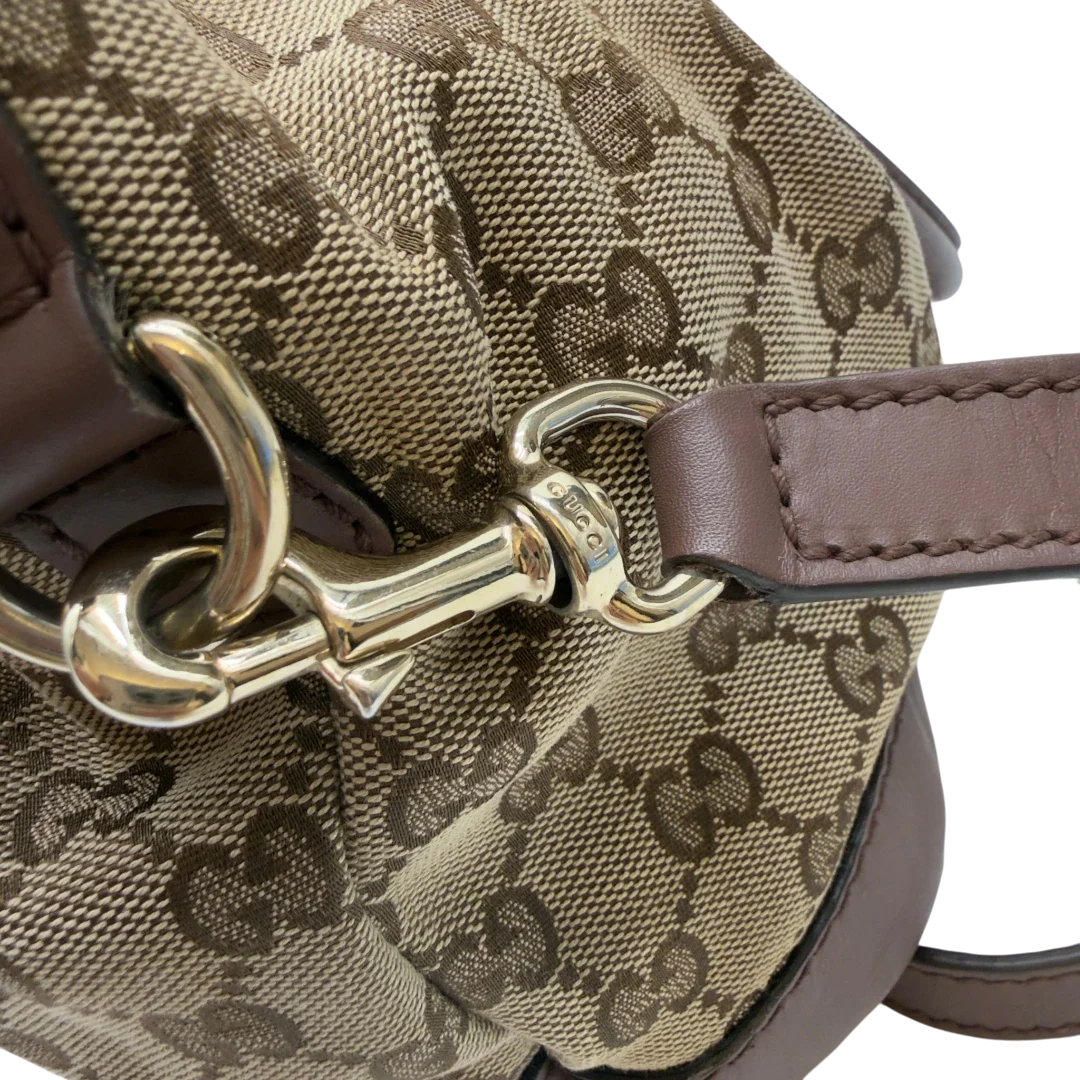 https://cdn.shopify.com/s/files/1/0564/9376/8855/files/Gucci_Handtasche_Sukey_mit_Umhangegurt_monogram_beige_17_2dea0ddb-6632-43de-94a8-e273c2ddb742.webp?v=1783513163