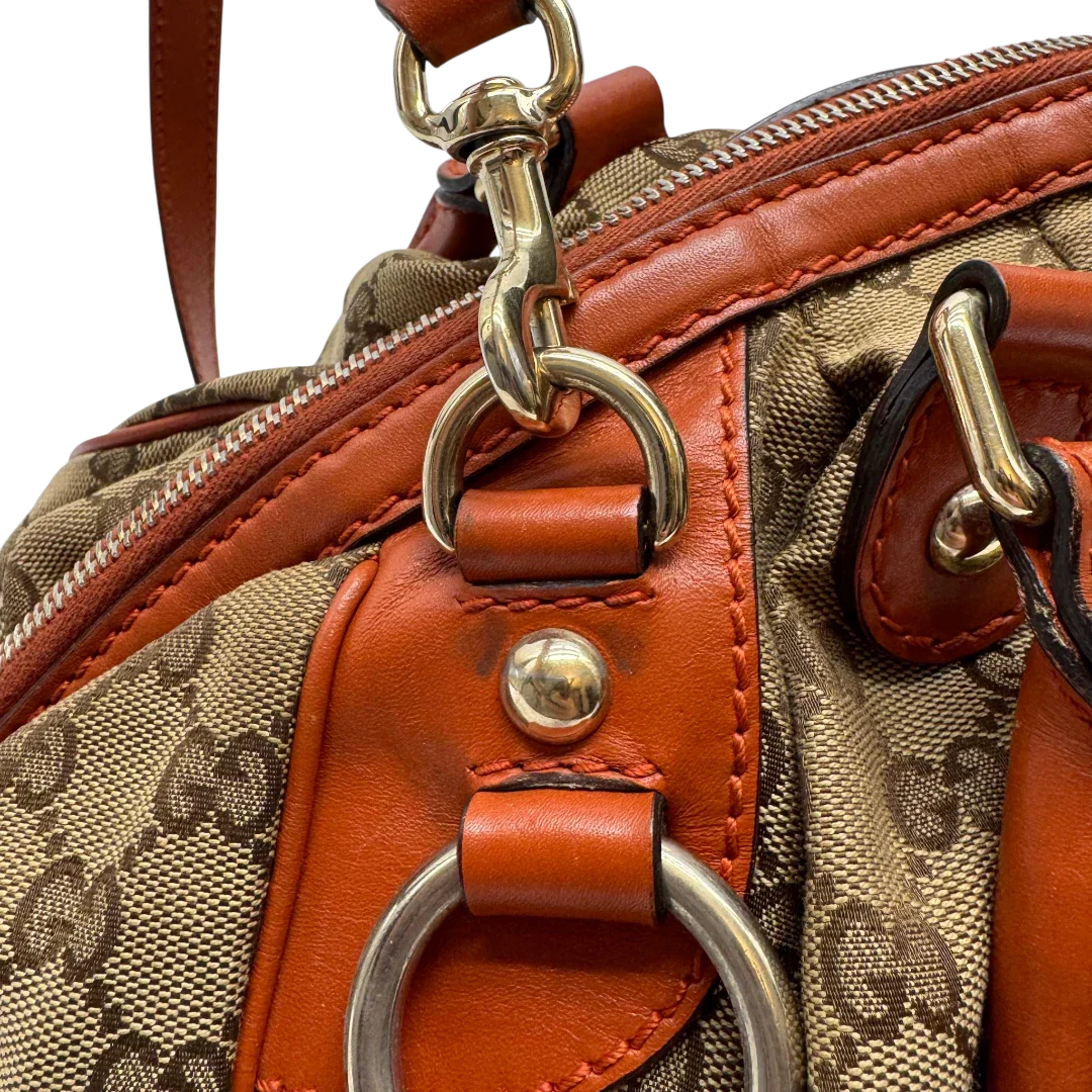 https://cdn.shopify.com/s/files/1/0564/9376/8855/files/Gucci_Handtasche_Sukey_mit_Umhangegurt_monogram_beige_17_9e0587e8-8e88-4fcf-b3e6-6af4abd257f0.webp?v=1784248099