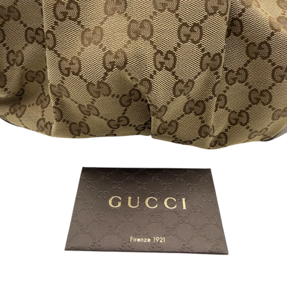 https://cdn.shopify.com/s/files/1/0564/9376/8855/files/Gucci_Handtasche_Sukey_mit_Umhangegurt_monogram_beige_18.webp?v=1782909395