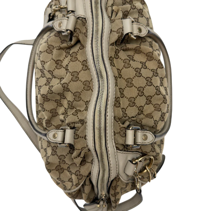 https://cdn.shopify.com/s/files/1/0564/9376/8855/files/Gucci_Handtasche_Sukey_mit_Umhangegurt_monogram_beige_19.webp?v=1783513327
