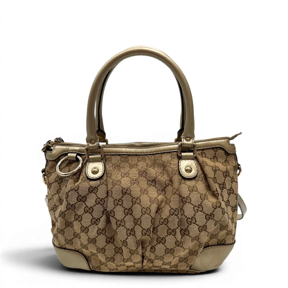 https://cdn.shopify.com/s/files/1/0564/9376/8855/files/Gucci_Handtasche_Sukey_mit_Umhangegurt_monogram_beige_1_57b84641-30d0-4130-b8eb-4d44ab03504b.webp?v=1784126195