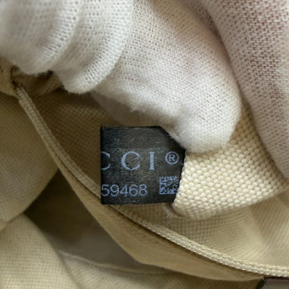https://cdn.shopify.com/s/files/1/0564/9376/8855/files/Gucci_Handtasche_Sukey_mit_Umhangegurt_monogram_beige_27.webp?v=1783513163