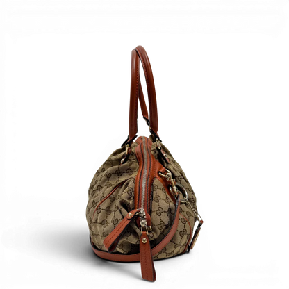 https://cdn.shopify.com/s/files/1/0564/9376/8855/files/Gucci_Handtasche_Sukey_mit_Umhangegurt_monogram_beige_2_e12f788d-0b1c-4552-9337-29a9df292a45.webp?v=1784248098