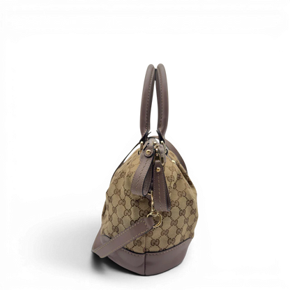 https://cdn.shopify.com/s/files/1/0564/9376/8855/files/Gucci_Handtasche_Sukey_mit_Umhangegurt_monogram_beige_3.webp?v=1782909394