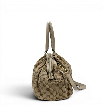 https://cdn.shopify.com/s/files/1/0564/9376/8855/files/Gucci_Handtasche_Sukey_mit_Umhangegurt_monogram_beige_3_4ce6e049-3d9a-4b71-87de-8a65eb6695cd.webp?v=1783513326