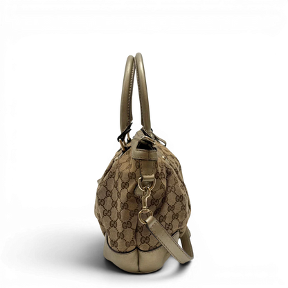 https://cdn.shopify.com/s/files/1/0564/9376/8855/files/Gucci_Handtasche_Sukey_mit_Umhangegurt_monogram_beige_3_e53104f9-ad41-4c6c-a031-83154c243b9c.webp?v=1784126195