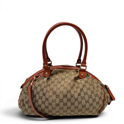 https://cdn.shopify.com/s/files/1/0564/9376/8855/files/Gucci_Handtasche_Sukey_mit_Umhangegurt_monogram_beige_4_bc0703e1-28d2-491b-8442-7ceda0c794d5.webp?v=1784248098