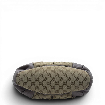 https://cdn.shopify.com/s/files/1/0564/9376/8855/files/Gucci_Handtasche_Sukey_mit_Umhangegurt_monogram_beige_5.webp?v=1782909395