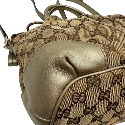 https://cdn.shopify.com/s/files/1/0564/9376/8855/files/Gucci_Handtasche_Sukey_mit_Umhangegurt_monogram_beige_6_fbf6f541-fd86-4595-88b4-58209bf6e889.webp?v=1784126196