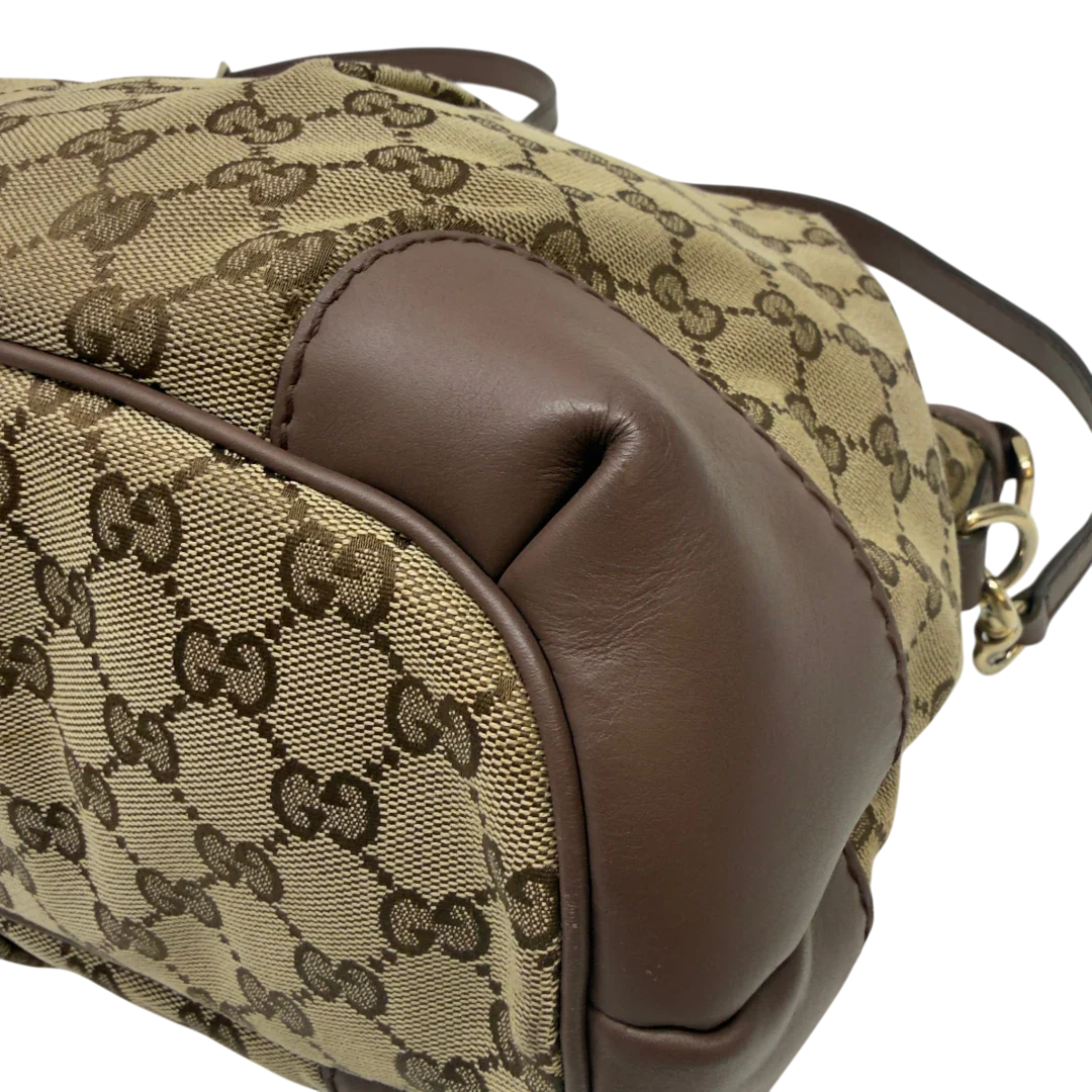 https://cdn.shopify.com/s/files/1/0564/9376/8855/files/Gucci_Handtasche_Sukey_mit_Umhangegurt_monogram_beige_7_0c46022f-9f5e-49e9-9f01-fbfa8b662af8.webp?v=1783513163