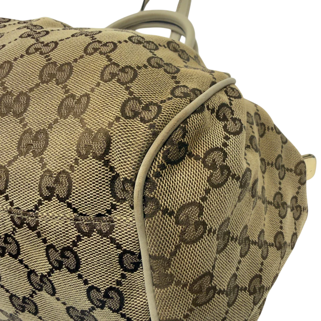 https://cdn.shopify.com/s/files/1/0564/9376/8855/files/Gucci_Handtasche_Sukey_mit_Umhangegurt_monogram_beige_7_f002d7df-9f6f-4fb1-8c92-821f0787ce99.webp?v=1783513327