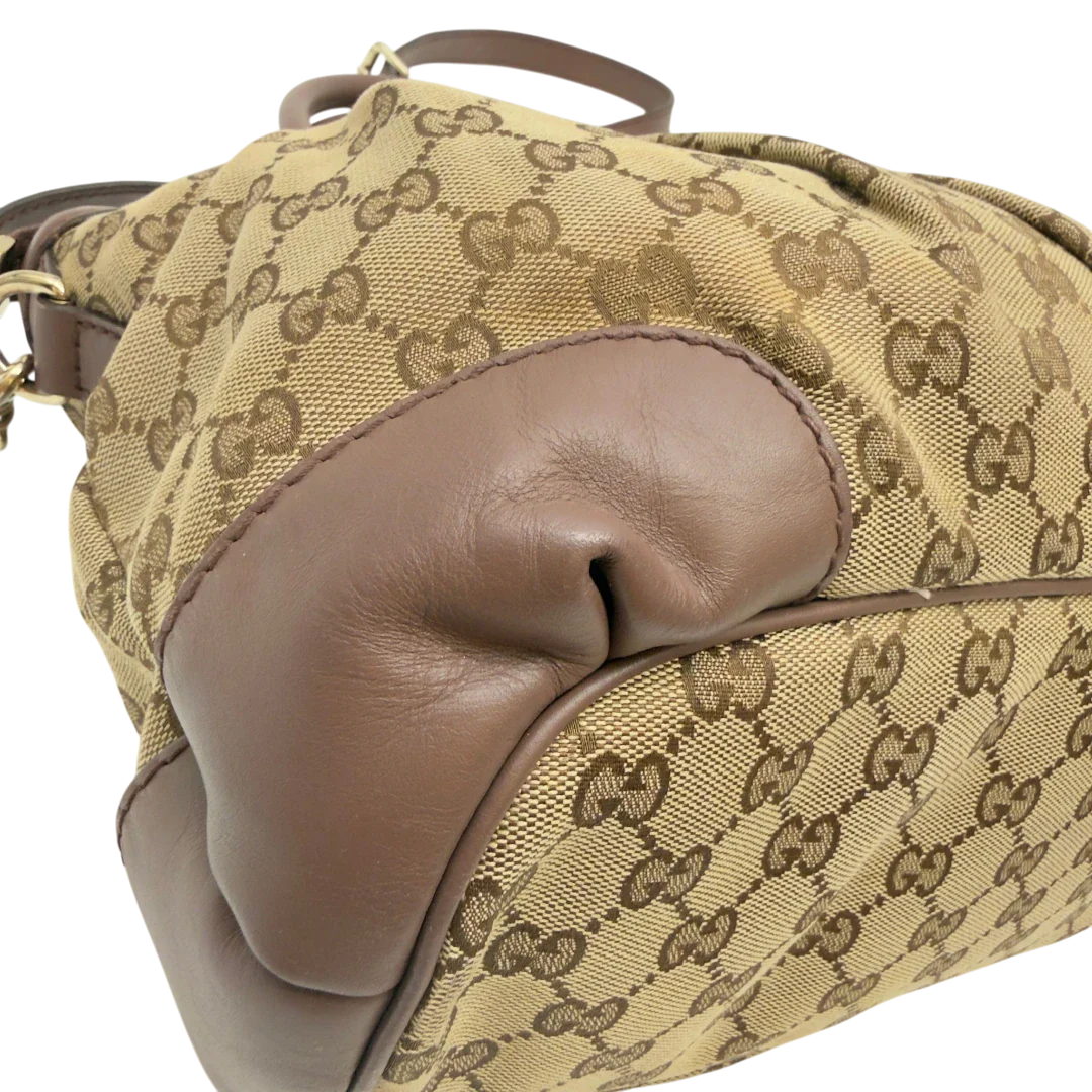 https://cdn.shopify.com/s/files/1/0564/9376/8855/files/Gucci_Handtasche_Sukey_mit_Umhangegurt_monogram_beige_8_29494961-4241-4f63-835c-bd526936bdd4.webp?v=1783513163
