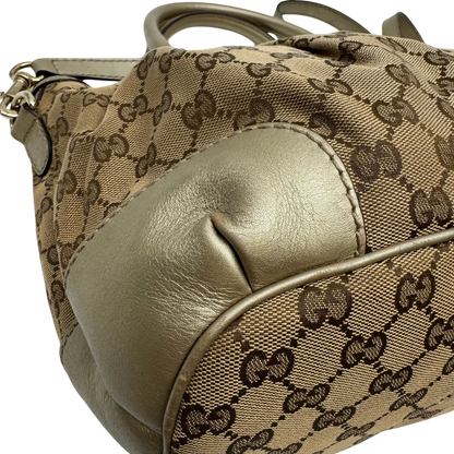 https://cdn.shopify.com/s/files/1/0564/9376/8855/files/Gucci_Handtasche_Sukey_mit_Umhangegurt_monogram_beige_8_7b981e7b-77eb-4067-8c14-148794314880.webp?v=1784126196