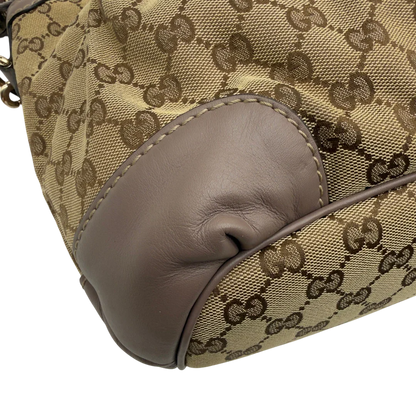 https://cdn.shopify.com/s/files/1/0564/9376/8855/files/Gucci_Handtasche_Sukey_mit_Umhangegurt_monogram_beige_9.webp?v=1782909396