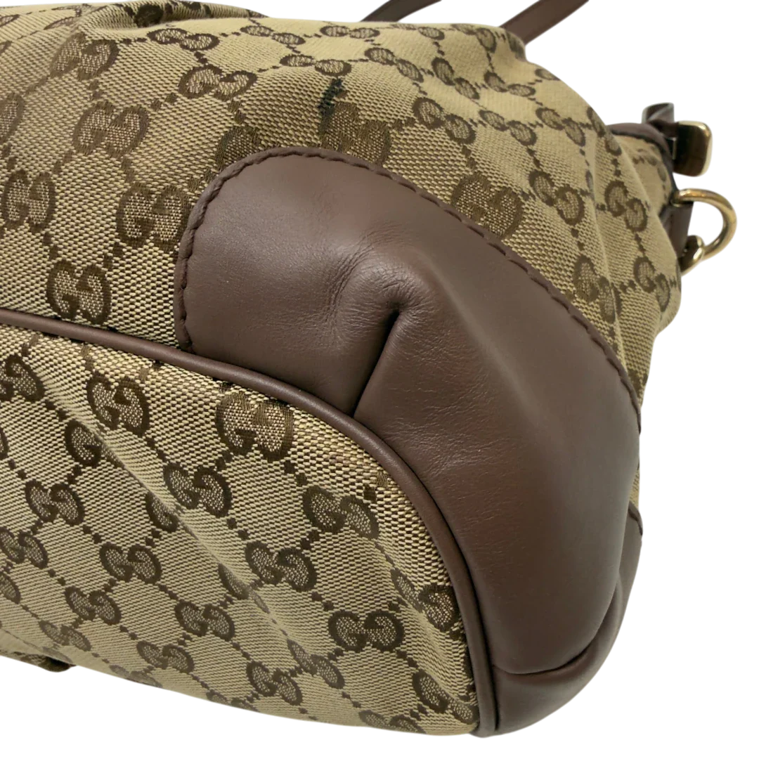https://cdn.shopify.com/s/files/1/0564/9376/8855/files/Gucci_Handtasche_Sukey_mit_Umhangegurt_monogram_beige_9_dcb25be4-e262-4365-a185-7e8655783dfb.webp?v=1783513163