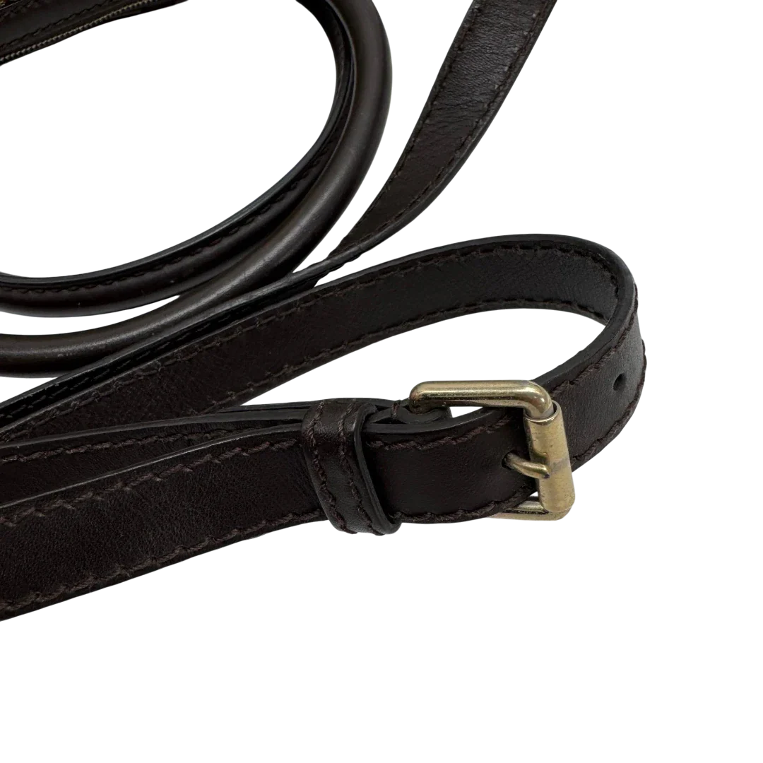https://cdn.shopify.com/s/files/1/0564/9376/8855/files/Gucci_Handtasche_Sukey_mit_Umhangegurt_monogram_beige_vintage_GG2334.webp?v=1779968392