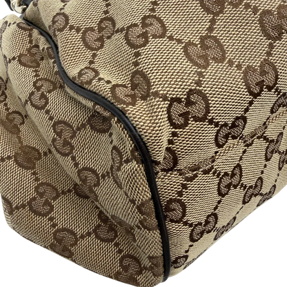https://cdn.shopify.com/s/files/1/0564/9376/8855/files/Gucci_Handtasche_Sukey_mit_Umhangegurt_monogram_beige_vintage_GG6112.webp?v=1775065519
