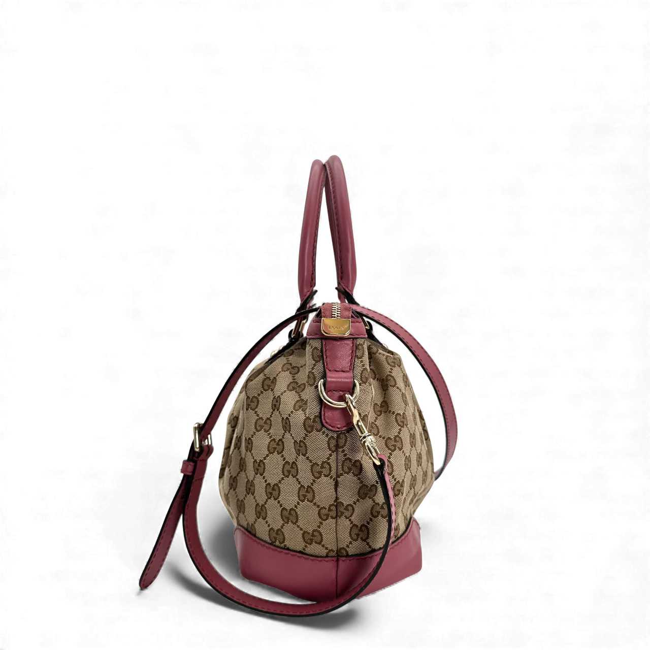 https://cdn.shopify.com/s/files/1/0564/9376/8855/files/Gucci_Handtasche_Sukey_mit_Umhangegurt_monogram_beige_vintage_GG_handbag0689.webp?v=1764856838