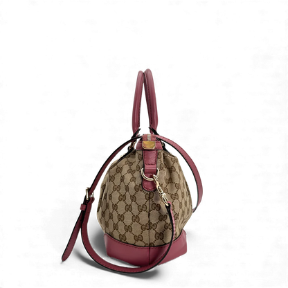 https://cdn.shopify.com/s/files/1/0564/9376/8855/files/Gucci_Handtasche_Sukey_mit_Umhangegurt_monogram_beige_vintage_GG_handbag0689.webp?v=1764856838