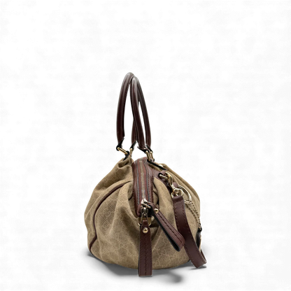 https://cdn.shopify.com/s/files/1/0564/9376/8855/files/Gucci_Handtasche_Sukey_mit_Umhangegurt_monogram_beige_vintage_GG_handbag3042.webp?v=1764854636