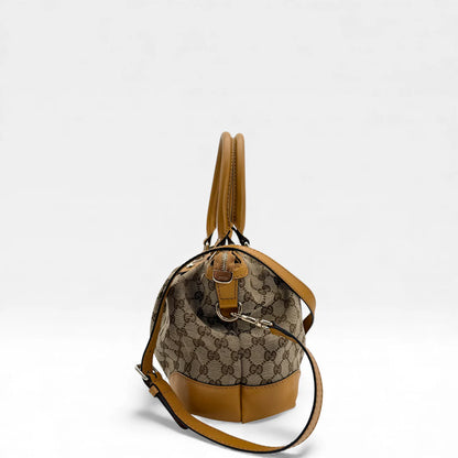 https://cdn.shopify.com/s/files/1/0564/9376/8855/files/Gucci_Handtasche_Sukey_mit_Umhangegurt_monogram_beige_vintage_GG_handbag_5038.webp?v=1765385313