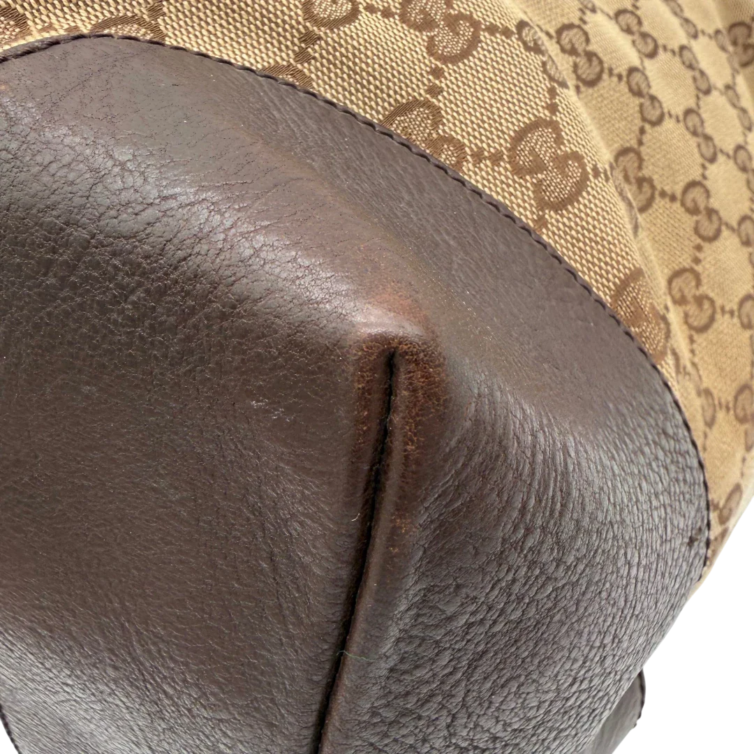 https://cdn.shopify.com/s/files/1/0564/9376/8855/files/Gucci_Handtasche_Tote_bag_monogram_beige_vintage_GG4517.webp?v=1775727732