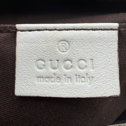 https://cdn.shopify.com/s/files/1/0564/9376/8855/files/Gucci_Handtasche_Trophy_mit_Gucci_Blume_beige_15.webp?v=1781713049