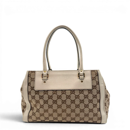 https://cdn.shopify.com/s/files/1/0564/9376/8855/files/Gucci_Handtasche_Trophy_mit_Gucci_Blume_beige_2.webp?v=1781713049