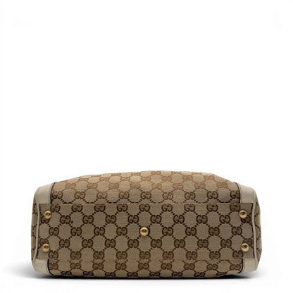 https://cdn.shopify.com/s/files/1/0564/9376/8855/files/Gucci_Handtasche_Trophy_mit_Gucci_Blume_beige_5.webp?v=1781713049