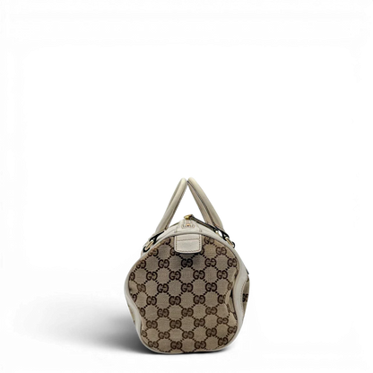 https://cdn.shopify.com/s/files/1/0564/9376/8855/files/Gucci_Handtasche_Zylinder_mit_Gucci_Blume_beige_vintage7849.webp?v=1780490136