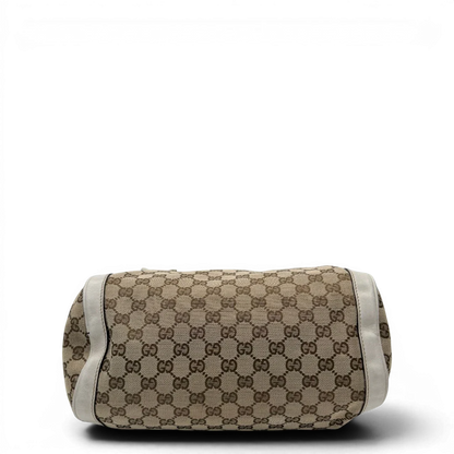 https://cdn.shopify.com/s/files/1/0564/9376/8855/files/Gucci_Handtasche_Zylinder_mit_Gucci_Blume_beige_vintage7853.webp?v=1780490136