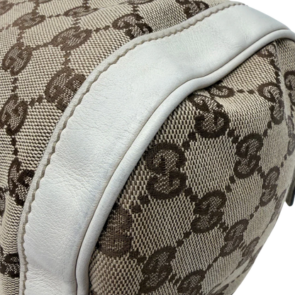 https://cdn.shopify.com/s/files/1/0564/9376/8855/files/Gucci_Handtasche_Zylinder_mit_Gucci_Blume_beige_vintage7854.webp?v=1780490137