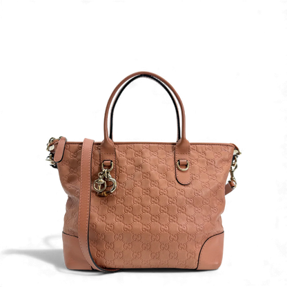https://cdn.shopify.com/s/files/1/0564/9376/8855/files/Gucci_Handtasche_aus_Leder_monogram_rosa_vintage_GG_handbag2861.webp?v=1764852002