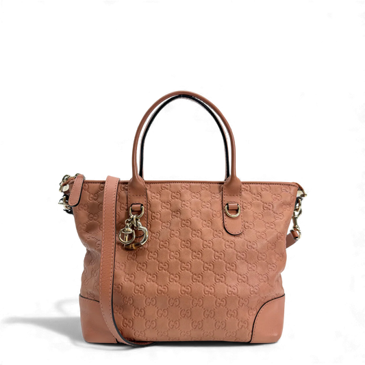 https://cdn.shopify.com/s/files/1/0564/9376/8855/files/Gucci_Handtasche_aus_Leder_monogram_rosa_vintage_GG_handbag2861.webp?v=1764852002
