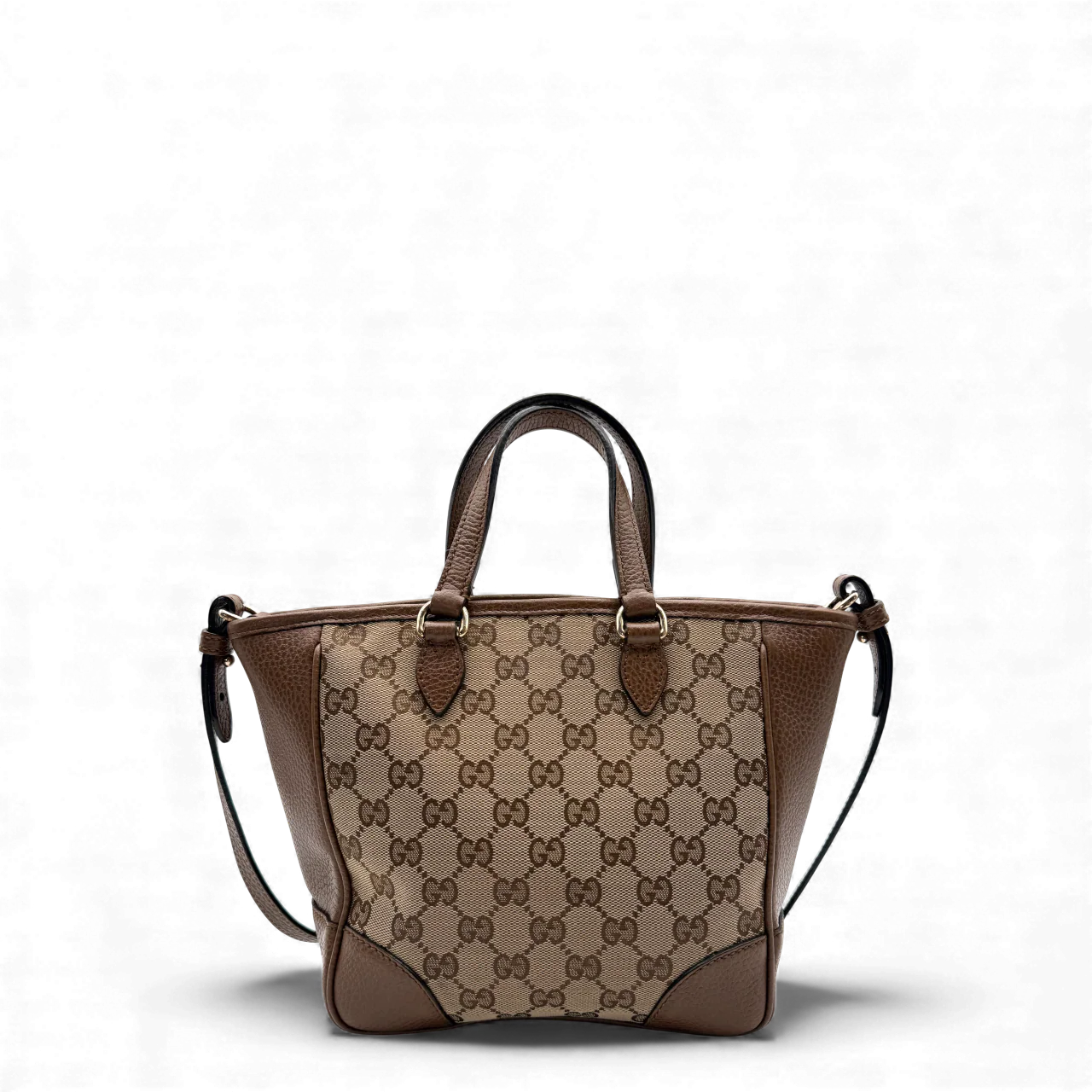 https://cdn.shopify.com/s/files/1/0564/9376/8855/files/Gucci_Handtasche_mit_Umhangegurt_monogram_beige___braun_vintage_GG_handbag3086.webp?v=1764897522