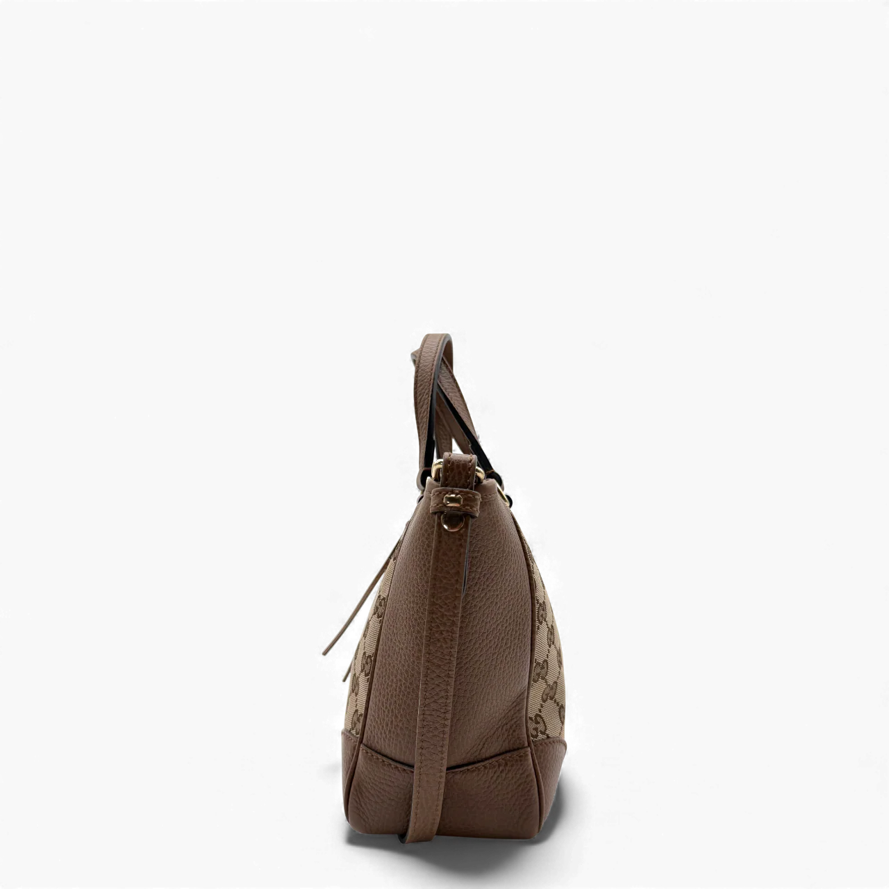 https://cdn.shopify.com/s/files/1/0564/9376/8855/files/Gucci_Handtasche_mit_Umhangegurt_monogram_beige___braun_vintage_GG_handbag3090.webp?v=1764897522